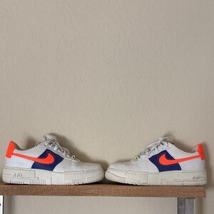Nike White and Neon Orange Sneakers with Blue Accents